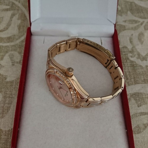 Oxette women's waterproof quartz watch with pink gold stainless steel bracelet and rhinestone bezel like new