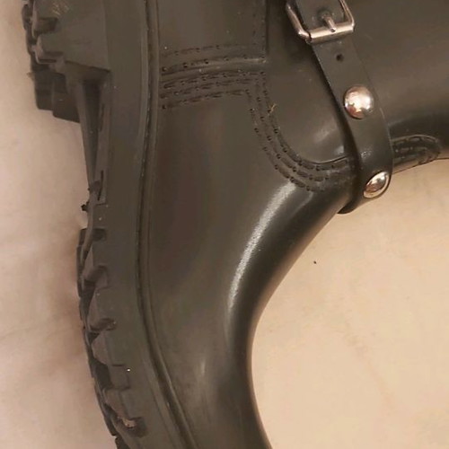 Women's galotses used size 37 durable plastic with cotton lining and removable studded strap