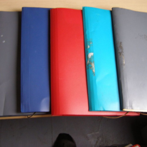 Plastic folders with elastic and tabs used, various colors