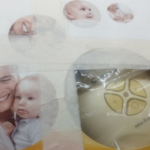 Medela Swing Maxi double breast pump with bra and accessories