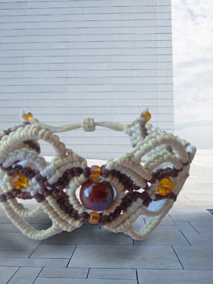 A moment bracelet new with artificial macrame and beads