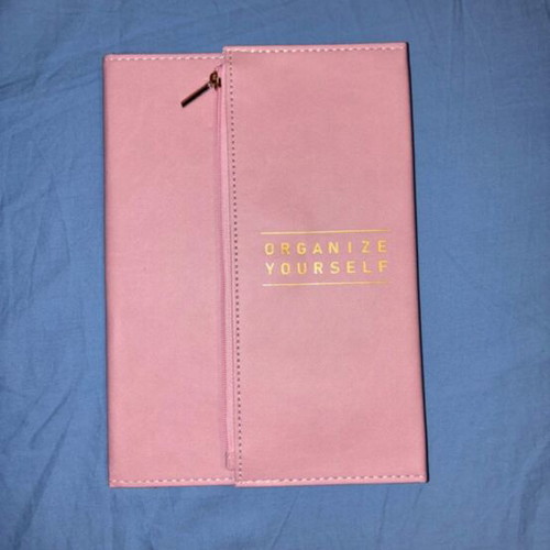 Journal and organizer with built-in small case for daily use