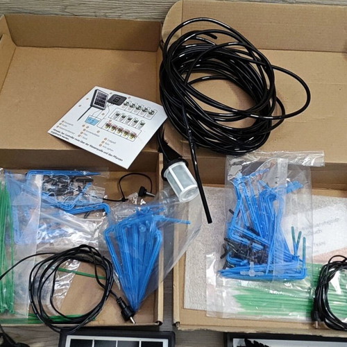 Solar panel set like new, 2 pieces with hoses and drip irrigation