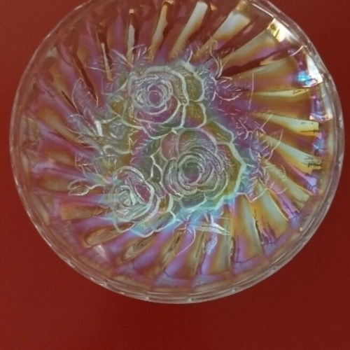 Vintage iridescent glass plate with embossed rose design