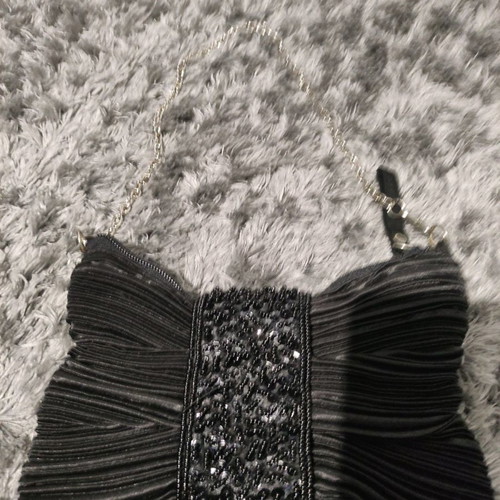 Evening bag new in black color with chain strap