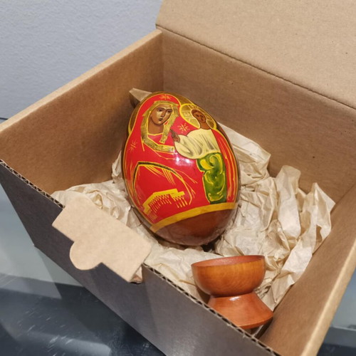 Russian egg used with hand-painted decoration and wooden base