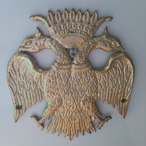 Metallic double-headed eagle coat of arms like new from old church