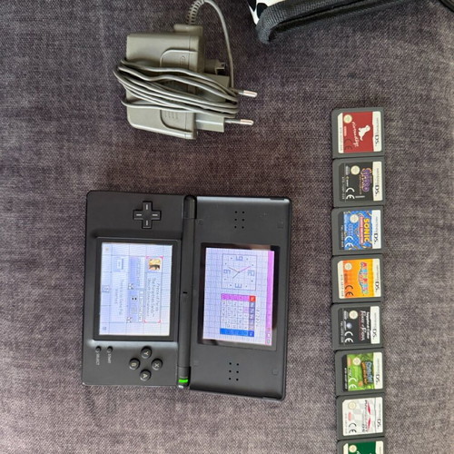 Nintendo DSLite used with 8 games and case