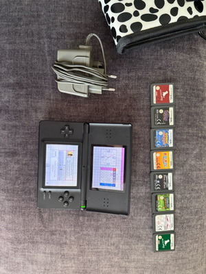 Nintendo DSLite μεταχειρισμένο με 8 παιχνίδια και θήκη