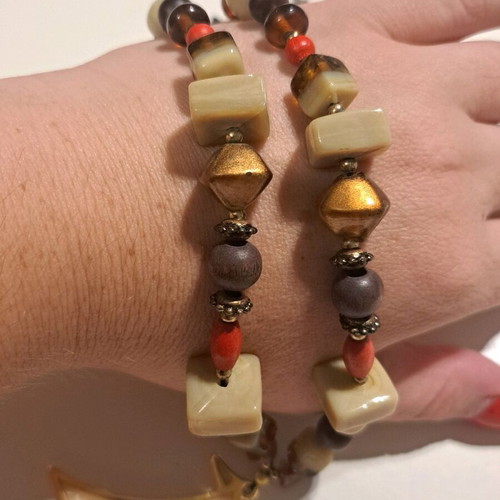 Necklace like new with multicolored beads and gold sailboat pendant
