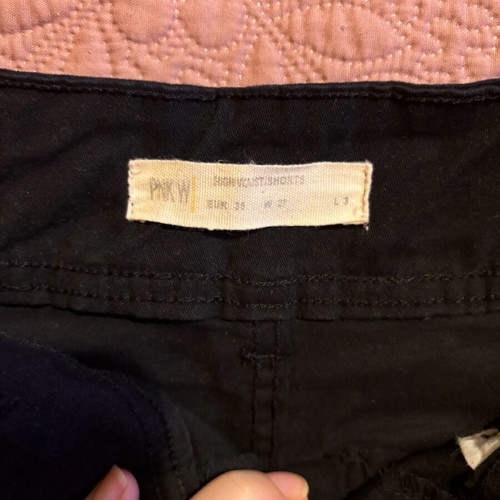 Shorts used, black, size approximately medium/small