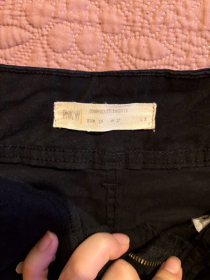 Shorts used, black, size approximately medium/small