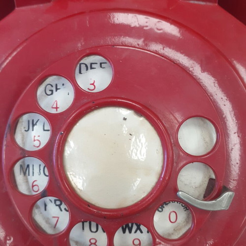 Western Electric red telephone used, 1960s-1970s