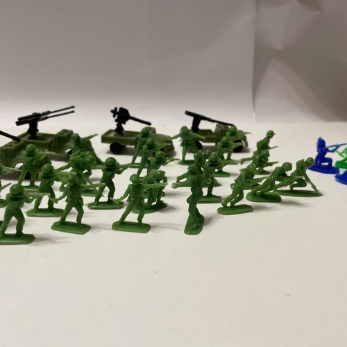 Small toy soldiers used, 26 soldiers, 3 Indians, 4 vehicles