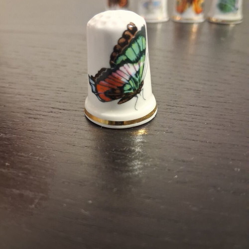 Vintage porcelain thimbles with butterfly, like new