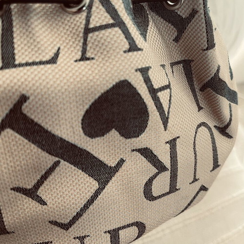 Furla pouch bag like new, monogram fabric and leather