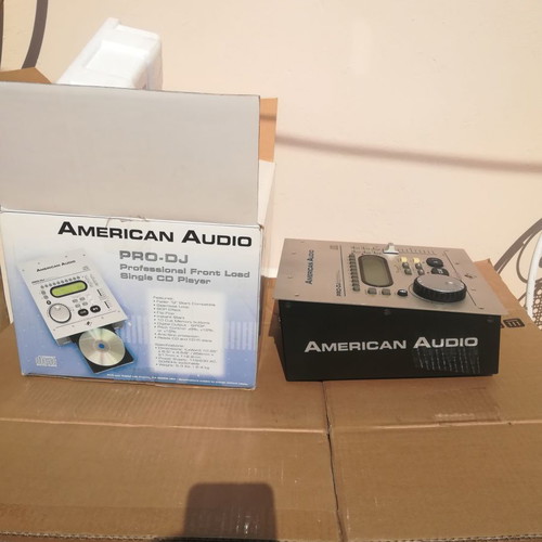 DJ CD sound used, two devices with boxes and papers