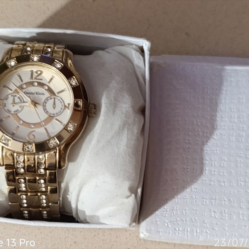 Daniel Klein wristwatch like new, gold bracelet, women's