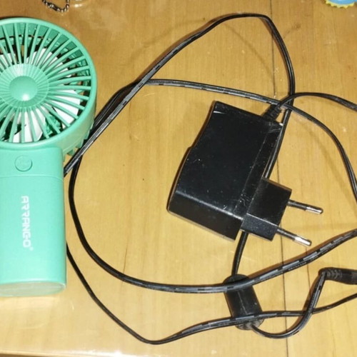 Handheld fan used with charger, battery-free, fully functional