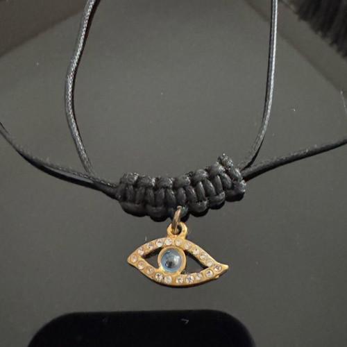 Adjustable necklace with cord and eye charm with rhinestones, new, black and gold