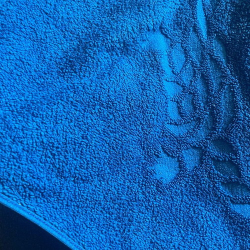Large cotton bath towel new, blue with embossed design