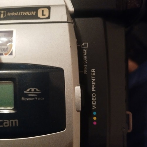 Sony Handycam DCR-TRV820E digital video camera used with printer, battery, charger