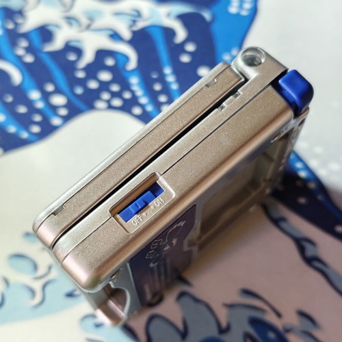 Silver Gameboy Advance SP shell with embossed Kyogre UV print