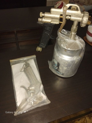 Paint spray gun with container used, professional
