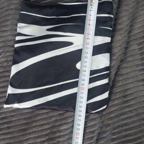 Women's crossbody bag like new with black and white pattern