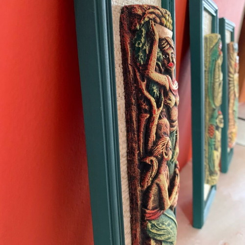 Handmade wooden frames with embossed exotic figures from Bali