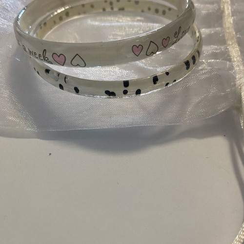 Bracelet set like new, white transparent with designs