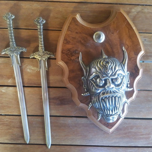 Decorative wall hanging used with swords