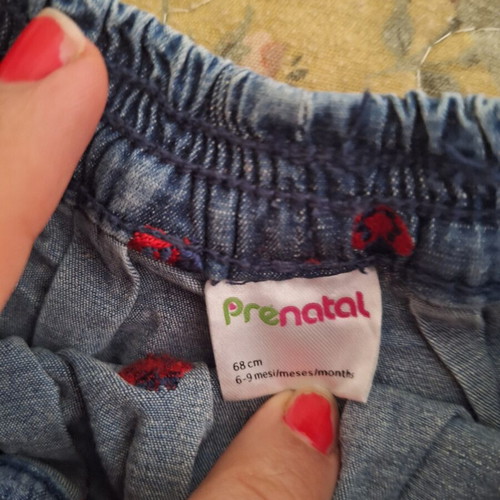 Baby denim skirt with embroidered ladybug design, like new