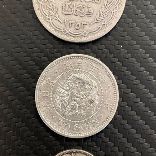 Silver coins used: 20 francs Tunisie 1935, 50 Sen Meiji 1898, 2 Jiao China 1932