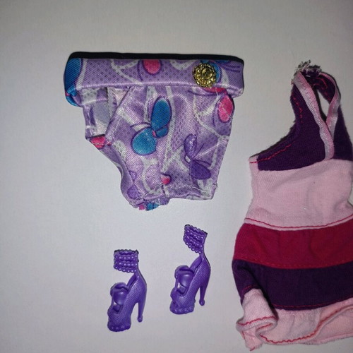 Barbie clothes and accessories set in purple tones like new