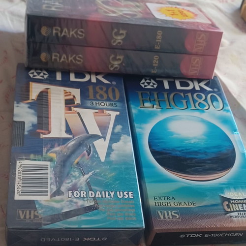 Sealed VHS video cassettes, 3 three-hour and 1 two-hour, new