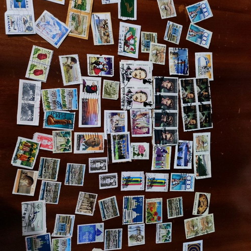 Various stamps used in 3 albums