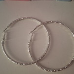 Large hoop earrings, 7 cm, embossed details