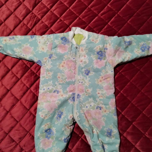 Baby sleeping bag or full-body romper with zipper and floral pattern like new
