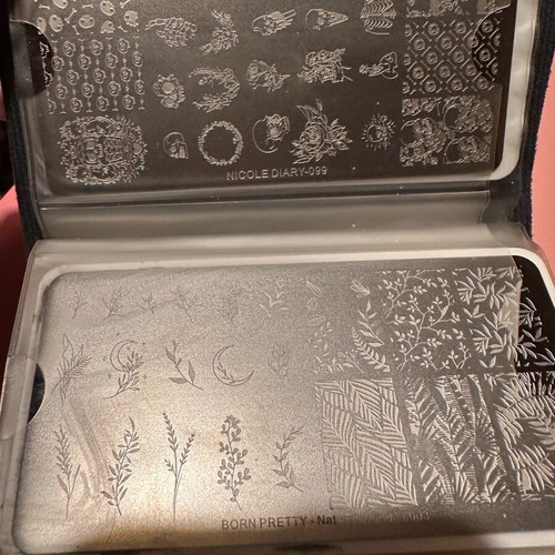 Nail stamps like new, set of 19 with case