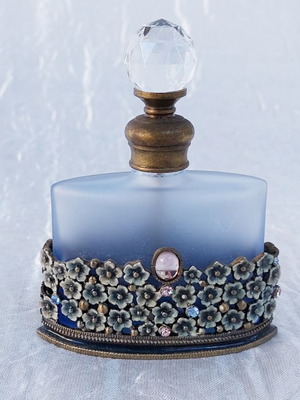 Vintage perfume bottle decorated with enamel and pink stones like new