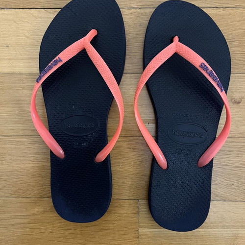 Havaianas slim flip flops size 39-40 like new, orange and black