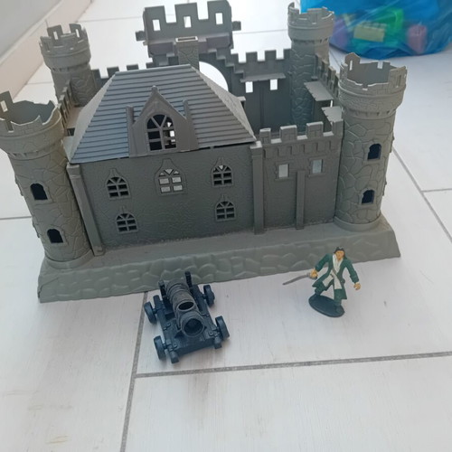Castle toy used, gray with warriors