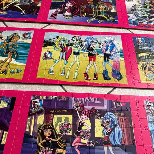 Monster High puzzle set like new, 9 glued on wood