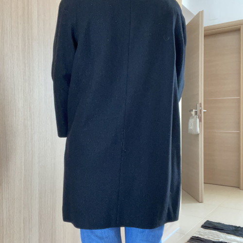 Black coat used with wool by Carling
