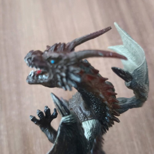 Dragon used, 11cm tall, missing finger on right hand
