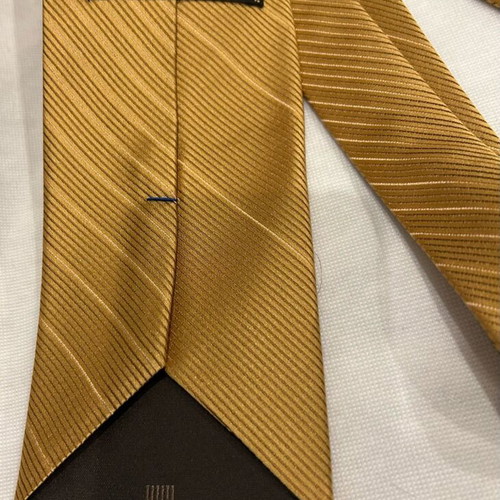 Lanvin tie like new, gold color