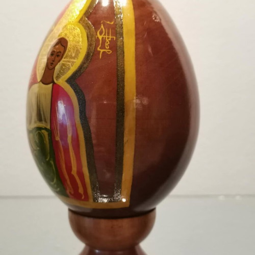 Russian egg used with hand-painted decoration and wooden base