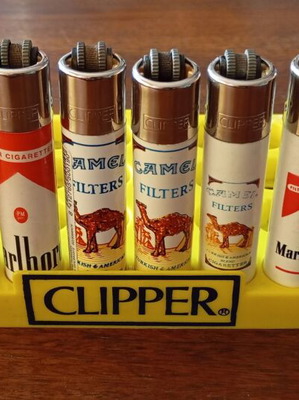 Clipper lighters like new, collectible 90s set with original holder