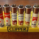 Clipper lighters like new, collectible 90s set with original holder